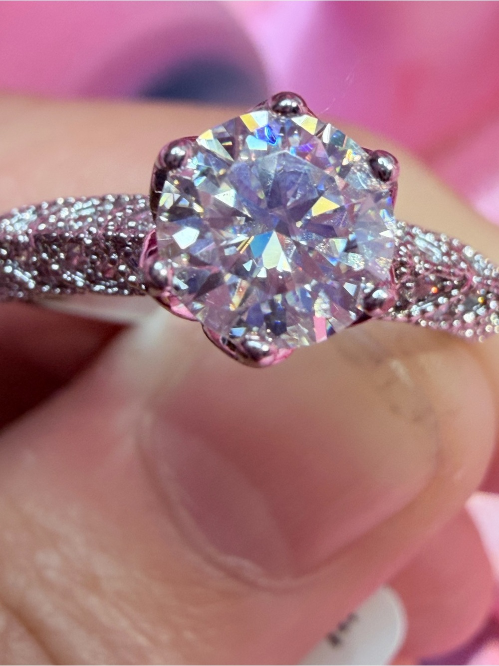 New Classic Solitaire Round-Cut Moissanite in a prong setting and pave' band